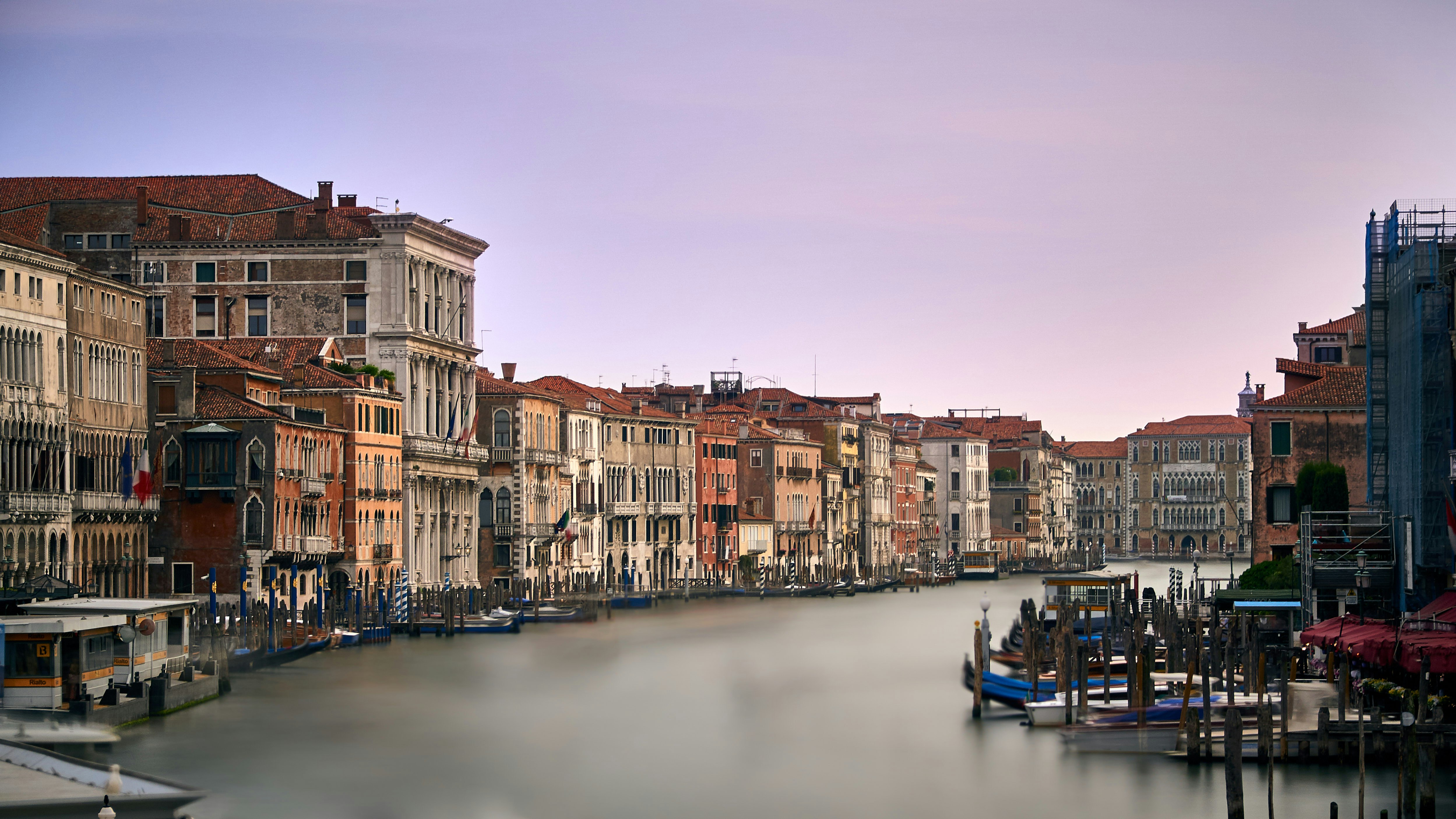 body of water surrounded by houses